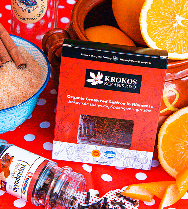 Ingredients for homemade greek tsipouro cinnamon orange liquor with oranges and peels and Krocus Kozanis, and clove Krocus Kozanis