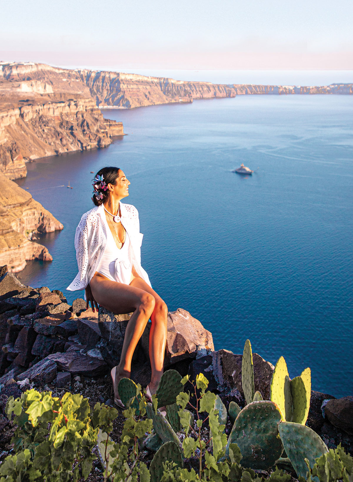 One of the best photo spots in Santorini, Imerovigli at Honeymoon Petra Villas, The Ultimate Santorini photo blog post at Travel to a Fairytale. The Ultimate Santorini Photo Guide