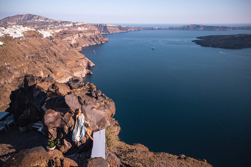 A view of the Santorini Caldera and the volcano from Imerovigli ith anna Myrha. Part of The Ultimate Santorini photo blog post at Travel to a Fairytale. The Ultimate Santorini Photo Guide