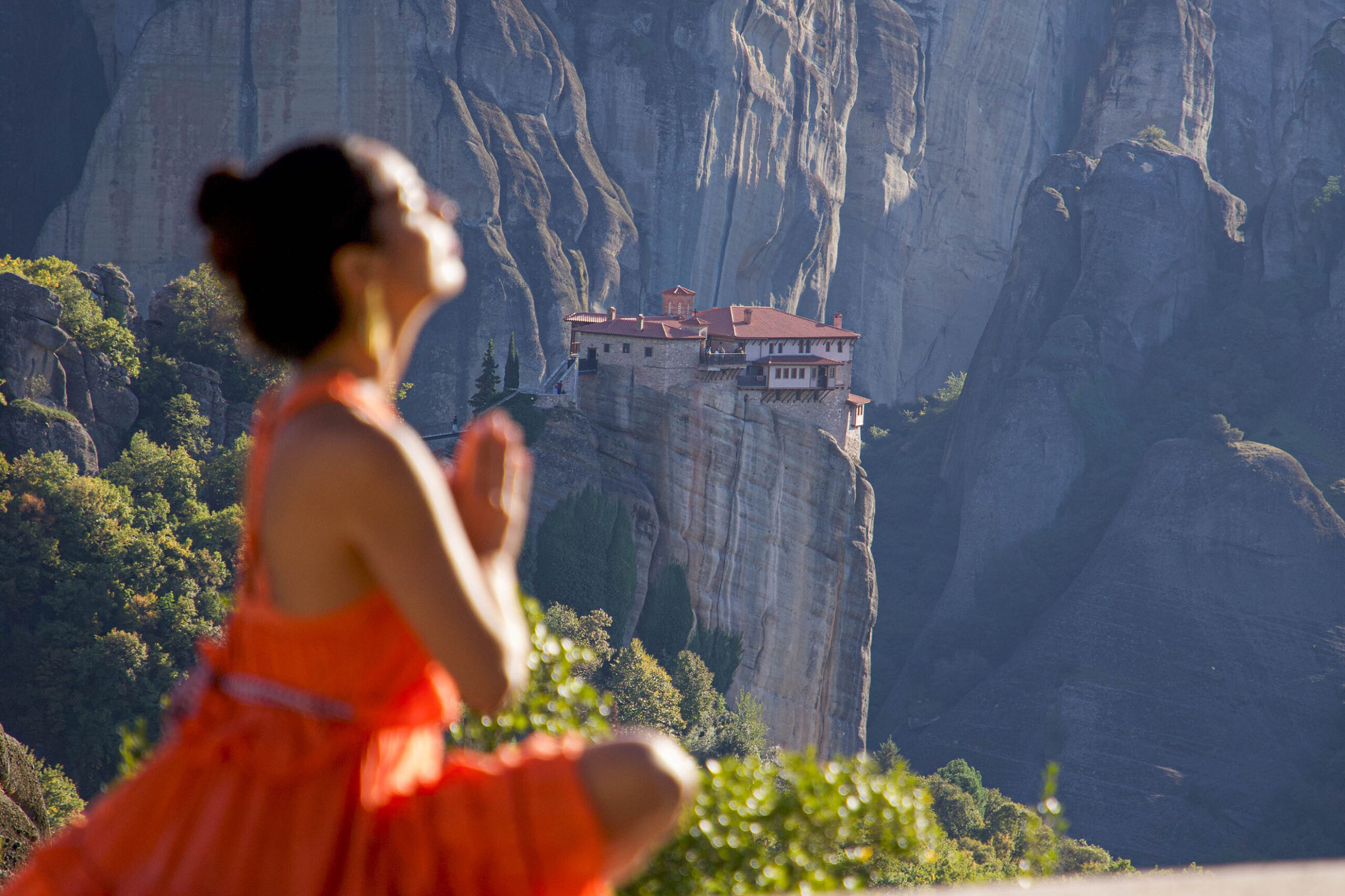 stunning view of Rousanou Monastery from the heights of Great Meteoron. The beauty of Meteora unfolds with every turn, where history and nature merge in a breathtaking landscape.